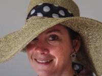 Paula&#39;s lovely beach hat bought from Francois on the beach. We didn&#39;t have enough money for the hat and the wrap she wanted so he said &#34;Take them and come pay me the rest tomorrow!&#34; You don&#39;t see that attitude from vendors here! We ended buying several items from Francois so it was a good strategy on his part to trust us!